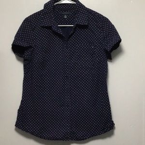Tommy Hilfiger button down shirt size medium.Color is navy blue with white dots